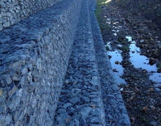 Gabion-Retaining-Walls_Mass-gravity-wall-wet-rotated-e1666304553794